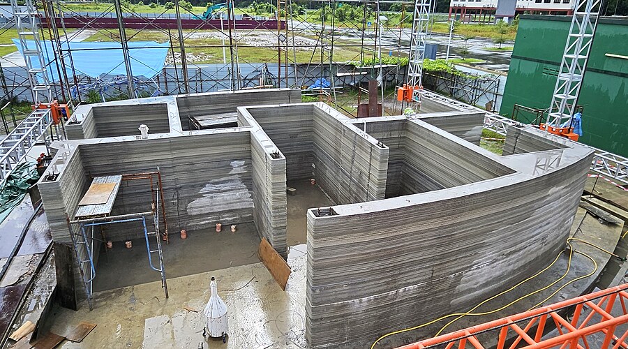 Complete 3D printed structure — all rooms formed, layer ridges visible on every wall